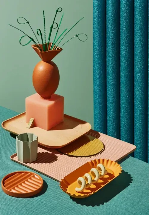 An array of vintage decor laying on a table.